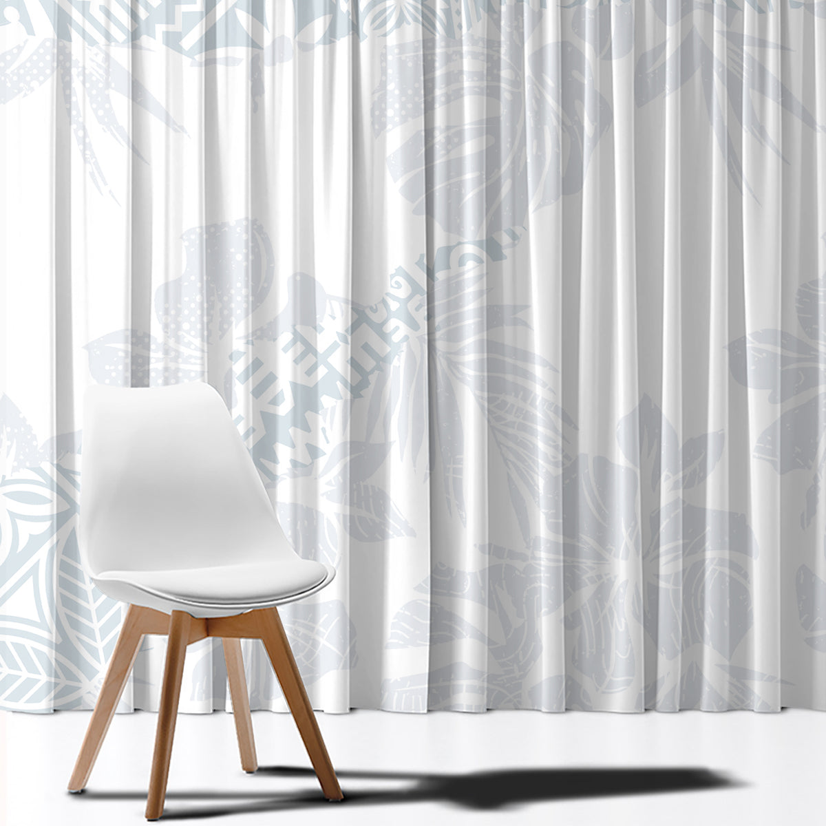 White window curtain panel with light blue abstract leaf print, gathered pleats