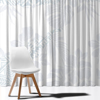 White window curtain panel with light blue abstract leaf print, gathered pleats