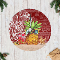 Red pineapple Christmas tree skirt with circular beige border and decorative center panel