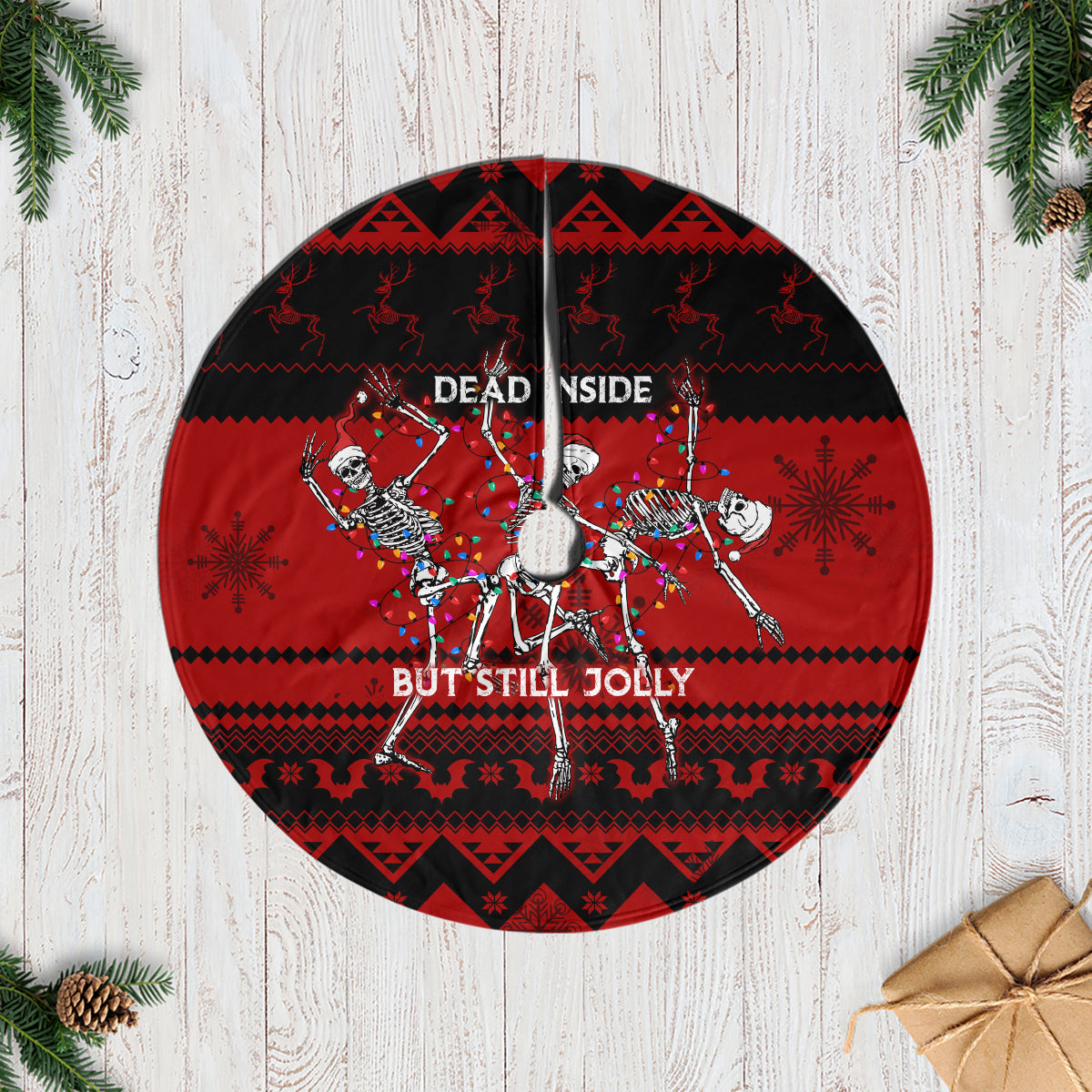 Round red and black tree skirt with jolly skull dancers and patterned border