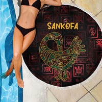 Round beach blanket with Sankofa bird and symbols in red and black, white fringe