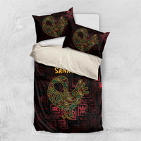 Sankofa bird bedding set flat-lay: duvet and two pillow shams with 'SANKOFA' and bird motif