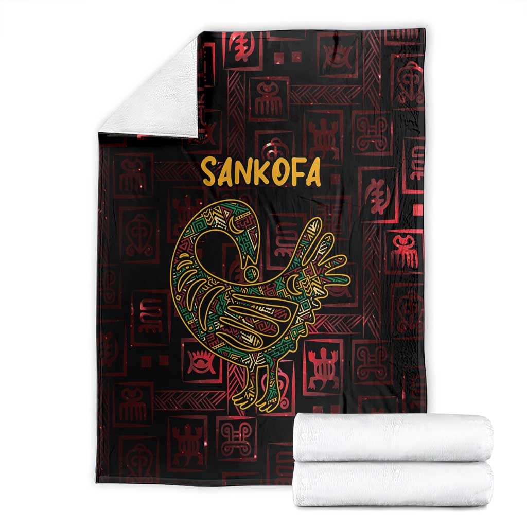 Africa Adinkra symbol blanket folded, showing Sankofa bird and Adinkra icons in gold on dark red