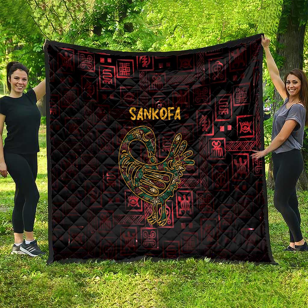 Sankofa bird symbol quilt in red and black with repeating Adinkra blocks and diamond quilting