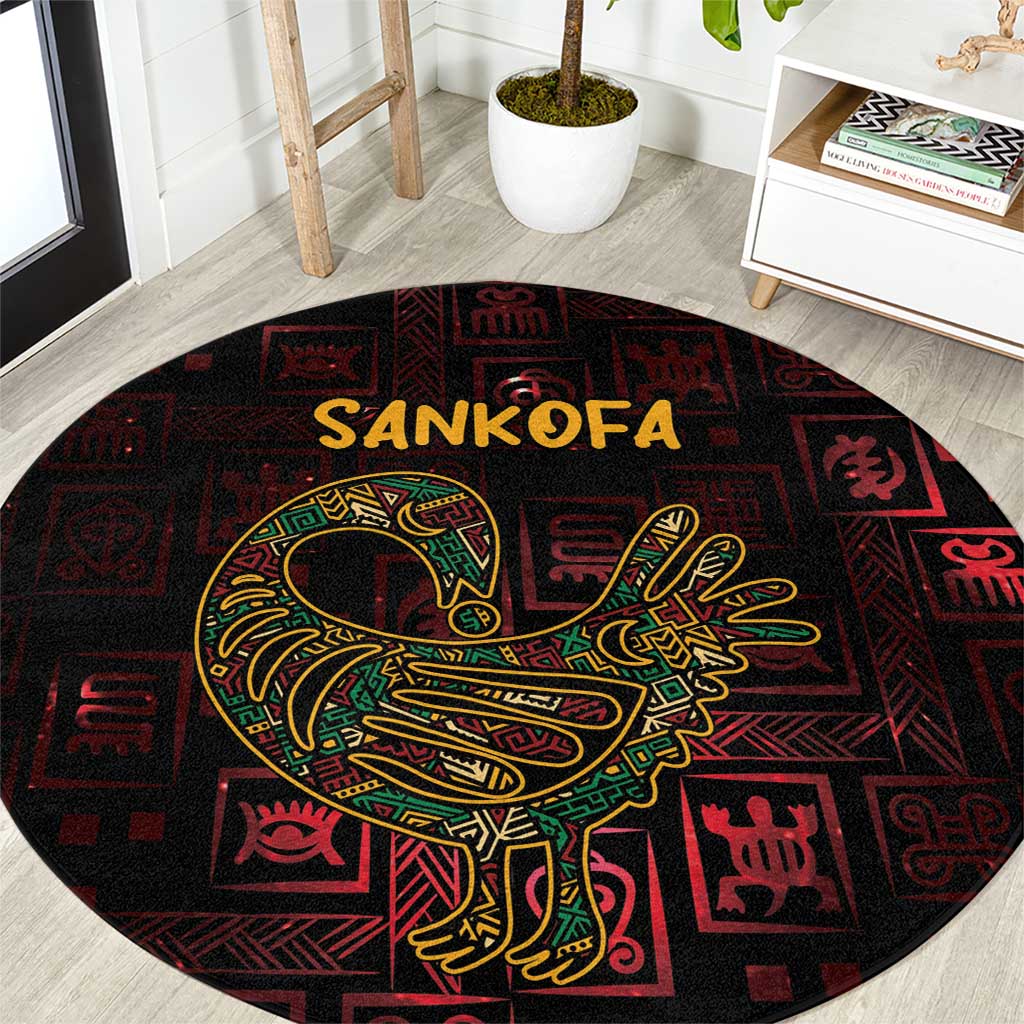 Round red-and-black carpet with Sankofa bird motif and circular Adinkra pattern