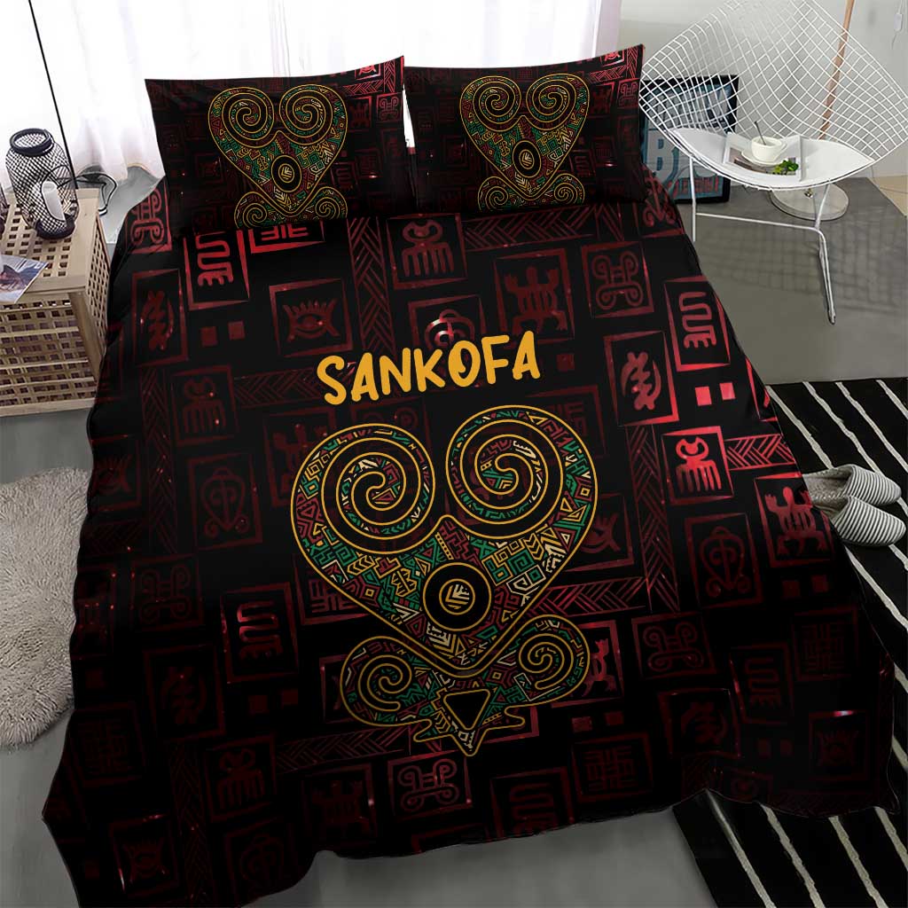Red and black bedding set with Sankofa heart motif and symbol blocks, two pillowcases