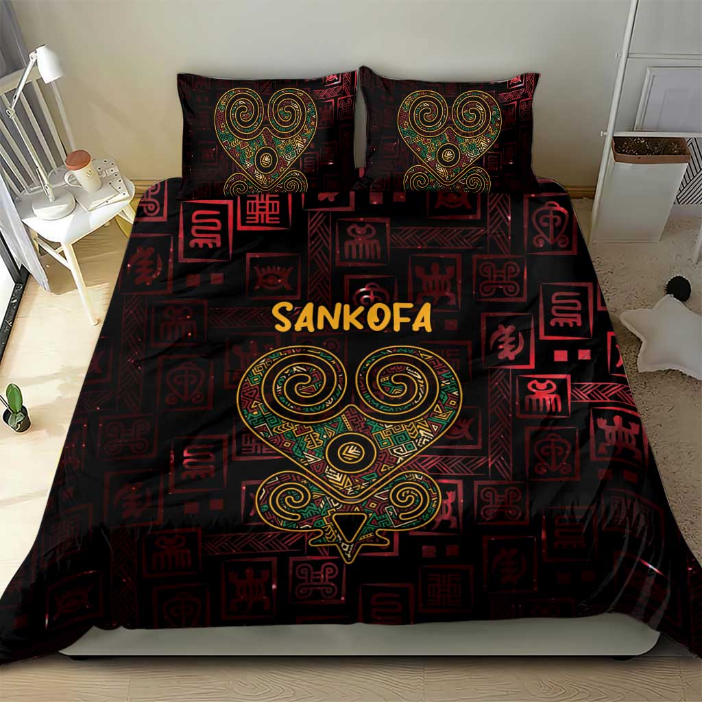 Red and black Sankofa bedding set with heart motif on duvet cover and two matching pillows