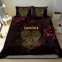Red and black Sankofa bedding set with heart motif on duvet cover and two matching pillows