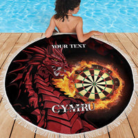 Round beach blanket with white fringe, black and red dragon artwork and flaming dartboard