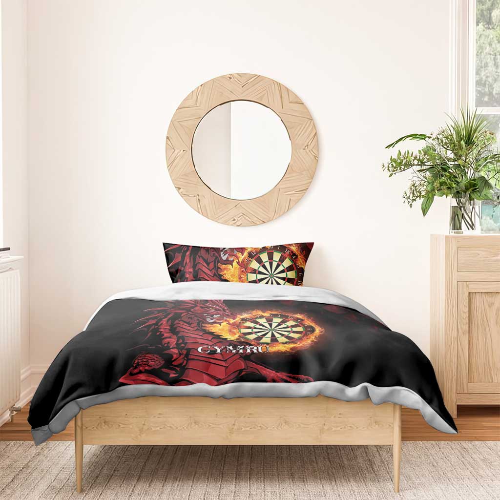 Black duvet with red dragon and dartboard graphic, shown on a bed