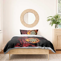 Black duvet with red dragon and dartboard graphic, shown on a bed