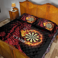 Black quilt bed set with red dragon and flaming dartboards; two decorative pillows.