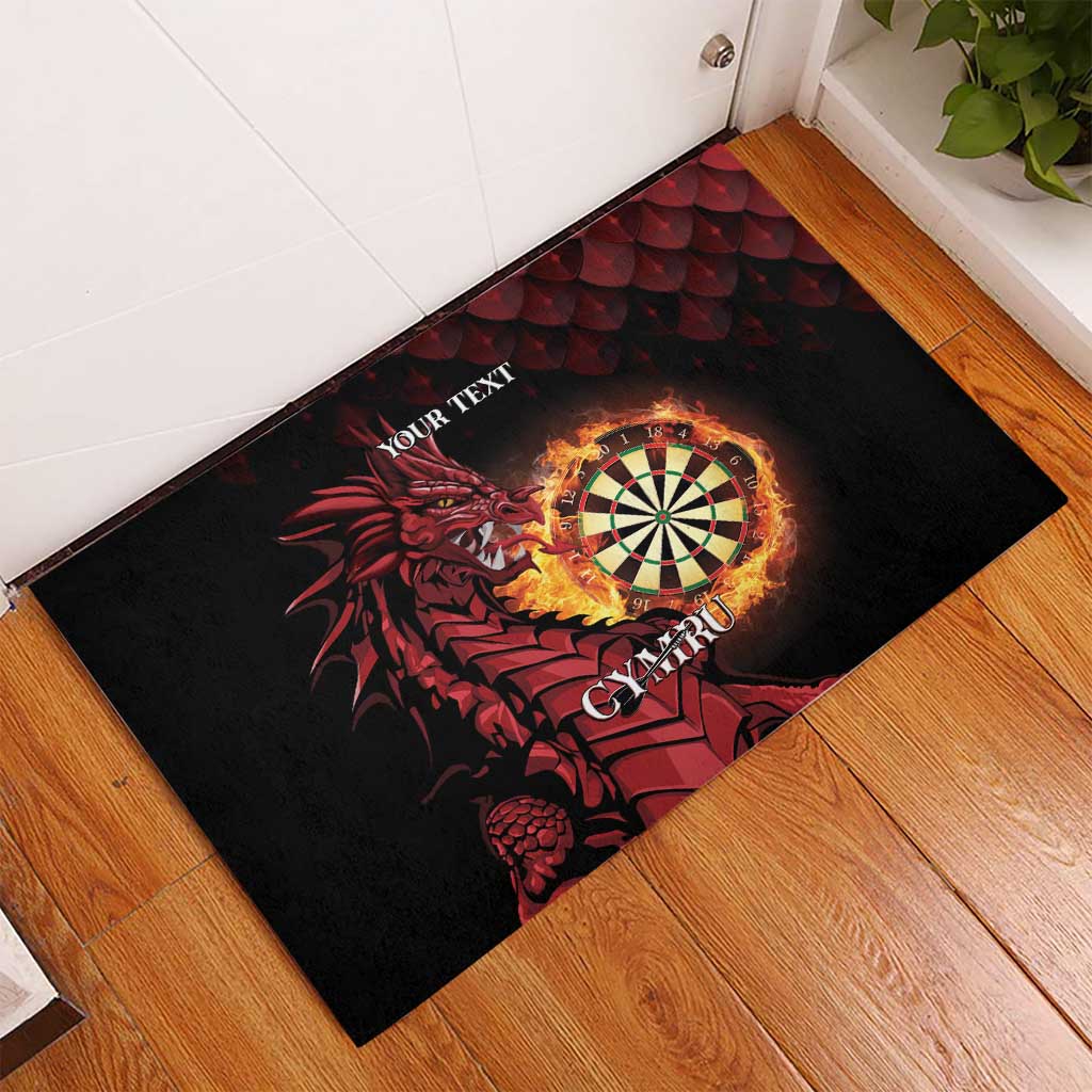Black rubber doormat corner view with red dragon dartboard and 'YOUR TEXT'.