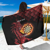 Personalised black sarong with large red dragon and dartboard graphic, laid flat