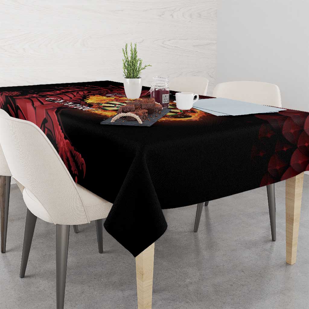 Black tablecloth with red dragon and dart board design, hanging down sides