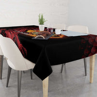 Black tablecloth with red dragon and dart board design, hanging down sides
