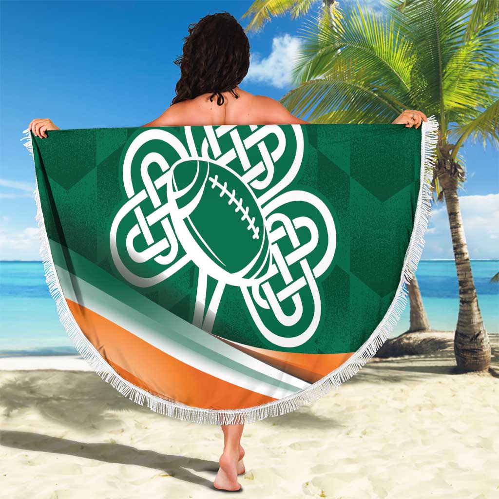 Green round beach blanket with Celtic football emblem and white fringe, orange stripe hem