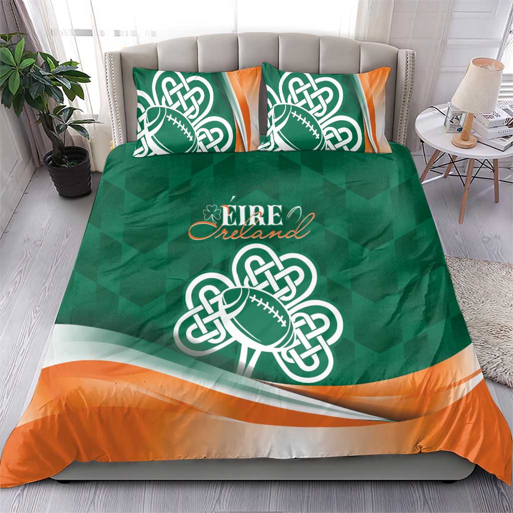 Green duvet with Celtic shamrock rugby emblem and orange wavy band, with two pillows