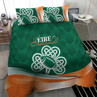 Green duvet featuring Celtic shamrock rugby logo and orange band, plus two pillows