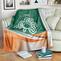 Green rugby blanket with Celtic shamrock design and Éire Ireland text