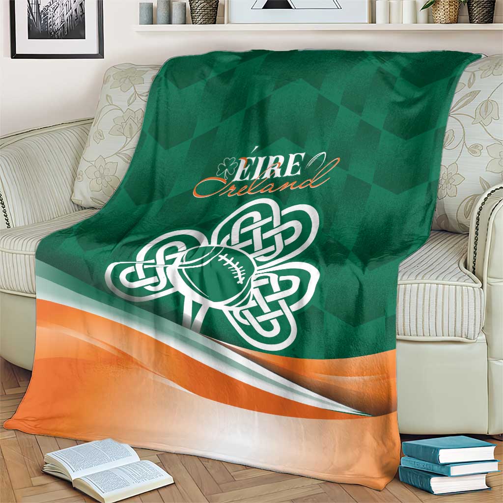 Blanket with green and orange shamrock rugby graphic and Éire Ireland text