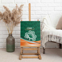 Celtic shamrock canvas wall art in green with orange waves, on an easel
