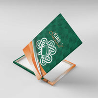 Green Celtic shamrock rugby canvas wall art with orange and white accents