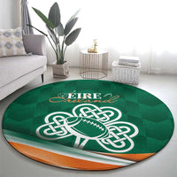 Green round rug with orange border, 'EIRE Ireland' and white Celtic knot football graphic