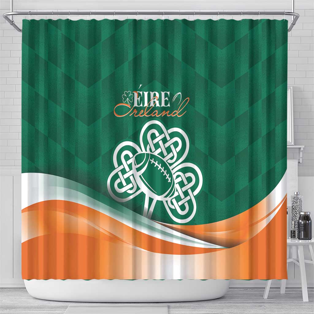 Green shower curtain featuring Ireland crest, shamrock football emblem, and orange wave hem