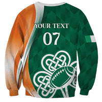Back view green sweatshirt, orange side panels, white 'YOUR TEXT' and '07' with shamrock football