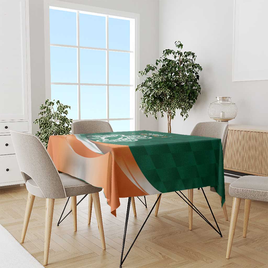 Green and orange tablecloth with central shamrock rugby celtic knot design