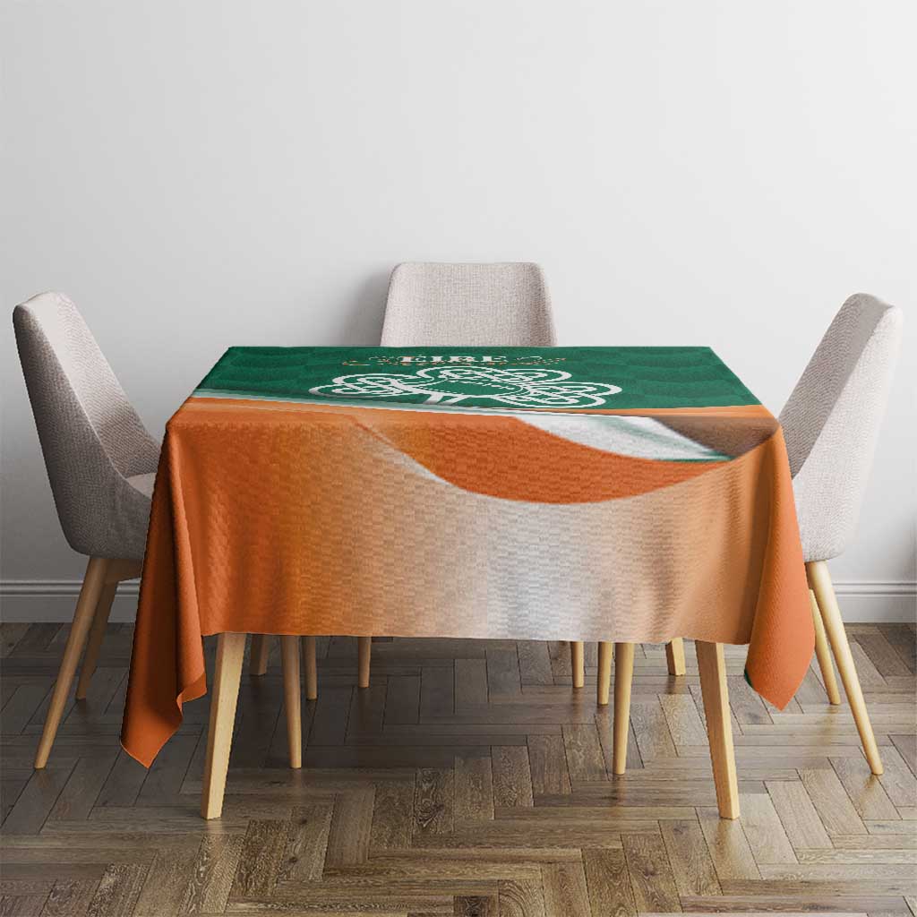 Green and orange celtic shamrock rugby tablecloth on dining table with chairs