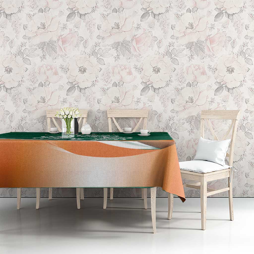Green and orange shamrock rugby tablecloth on dining table with matching chairs