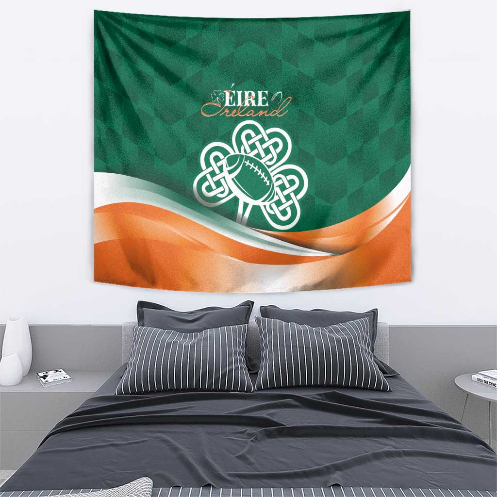 Green tapestry with Celtic knot rugby ball and orange wave stripe