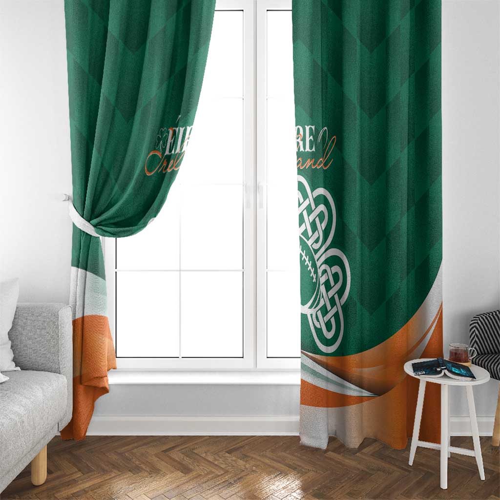 Green window curtain panels with Celtic shamrock emblem and orange bottom wave