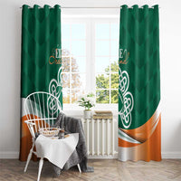 Green window curtain pair with Celtic shamrock emblem and orange wave band