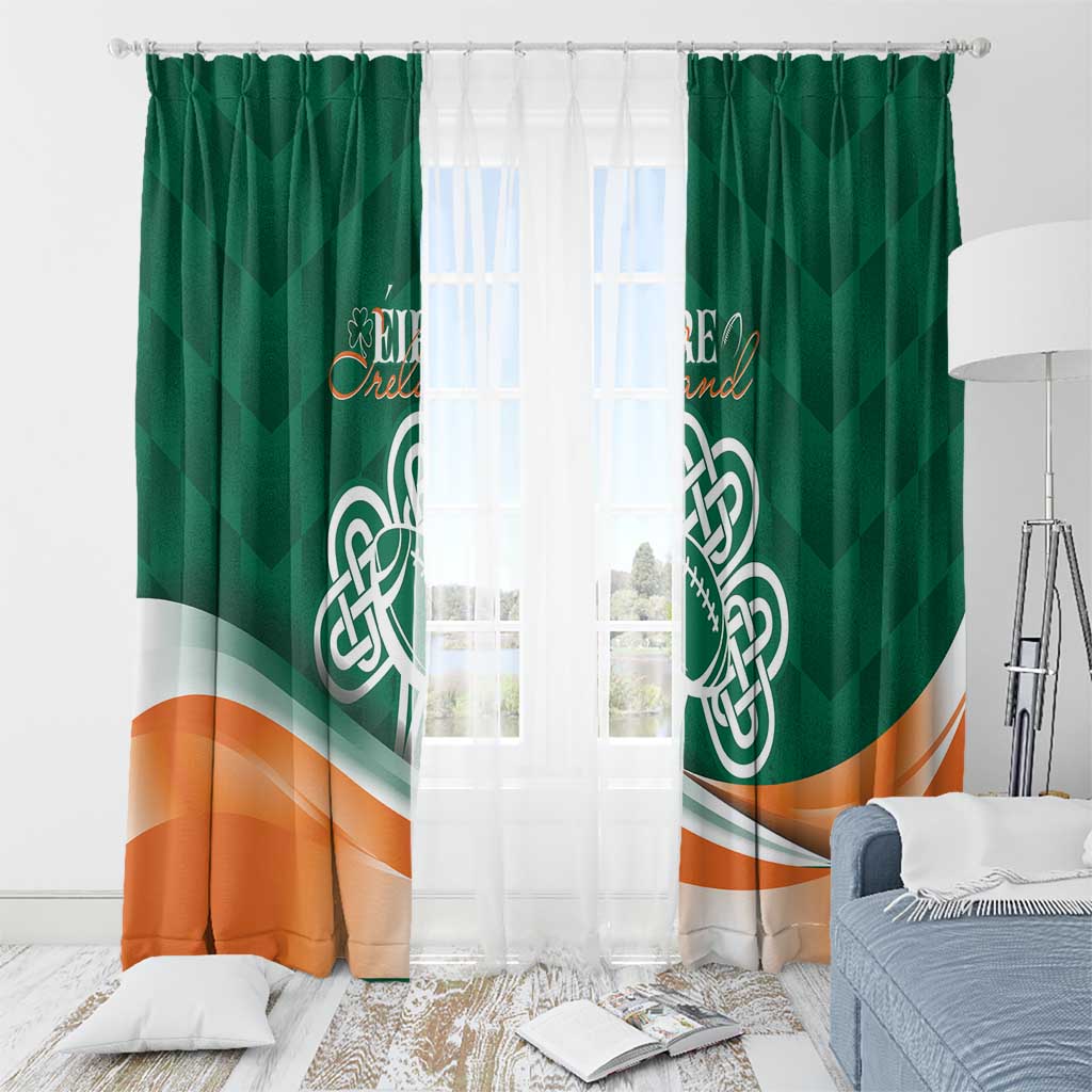 Green window curtain pair with Celtic shamrock emblem and orange wave hem
