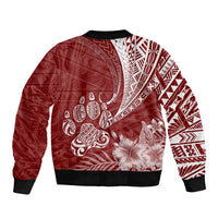 Red bomber jacket with Polynesian tribal print, floral accents and bulldog silhouette on back