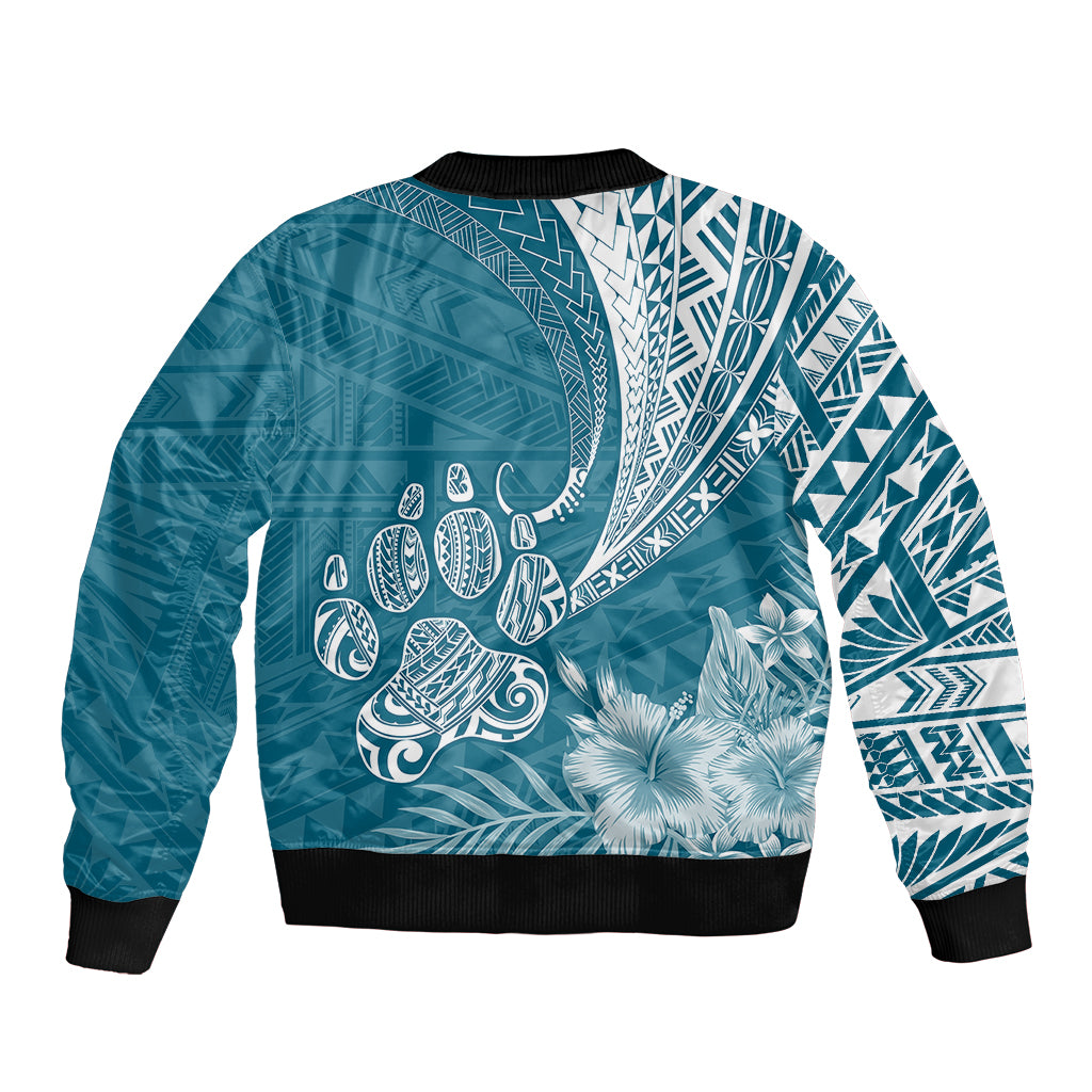 Teal bomber jacket with tribal patterns, cactus and floral print, ribbed collar and cuffs