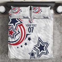 White rugby-themed bedding set with stars, red/blue swirls, and text “YOUR TEXT 07”, two pillows