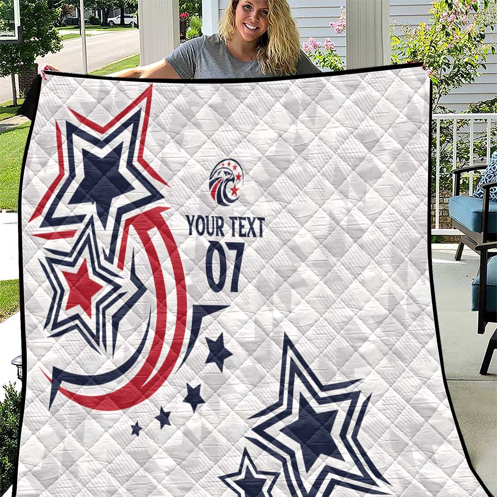 White custom quilt with blue and red star graphics and personalized text print