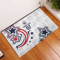 Custom rubber doormat on wood floor with gray pattern and large blue stars