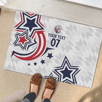 Custom rubber doormat with navy stars, red accents, and "Your Text 07" near shoes