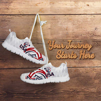 White sneakers with black sole, USA crest and red stripe accents; custom message area