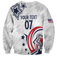 White unisex sweatshirt with navy stars, red/blue graphic, and 'YOUR TEXT 07' print