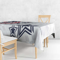 White and gray tablecloth with navy star and chevron-style stripes