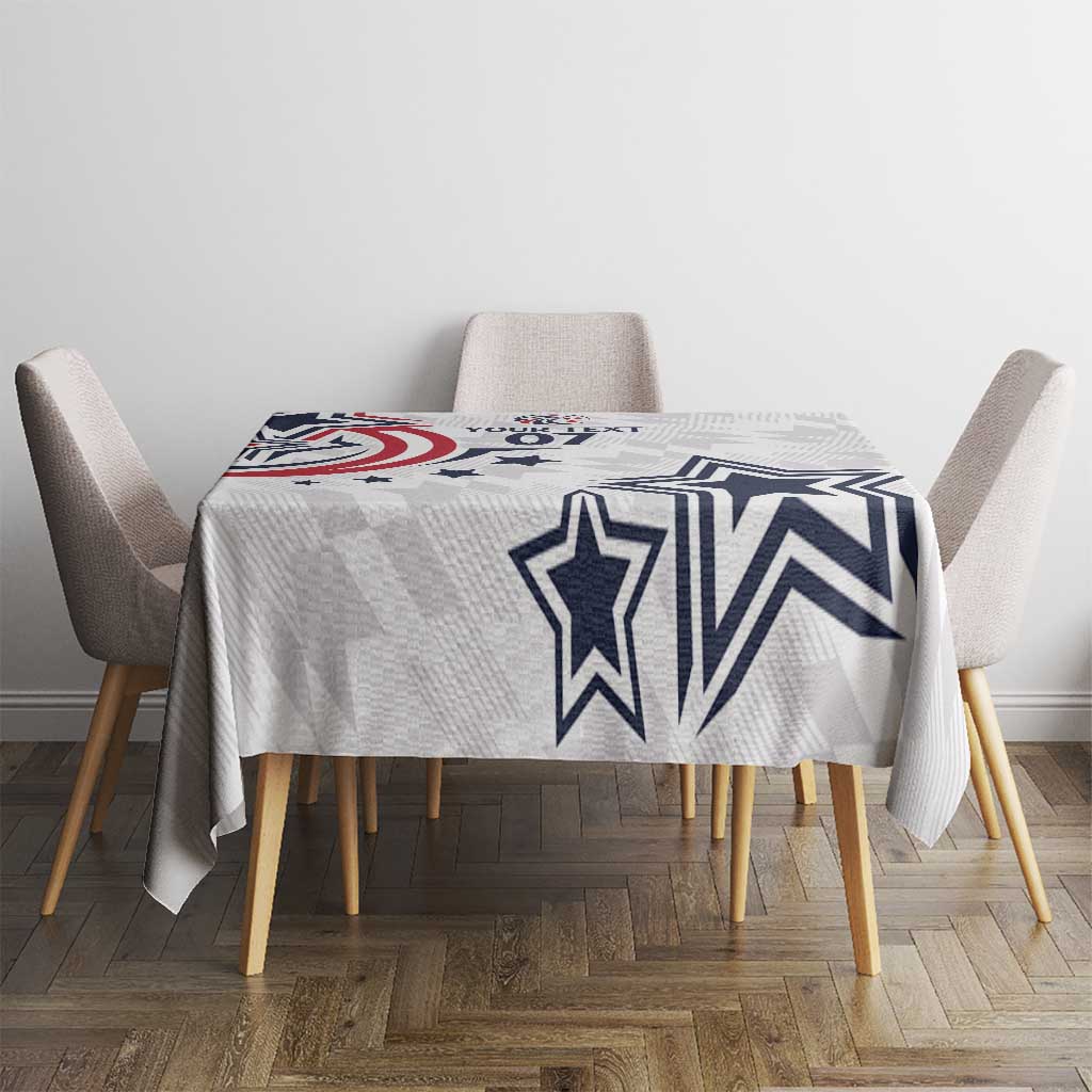 White tablecloth with large navy star and chevron stripes on gray geometric base