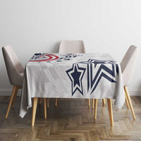 White tablecloth with large navy star and chevron stripes on gray geometric base