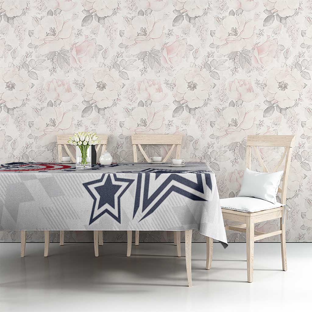 White tablecloth with navy star and stripe motif on gray geometric background