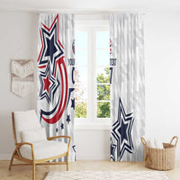 White window curtain pair with bold blue star and red stripe accents on diamond-pattern fabric.